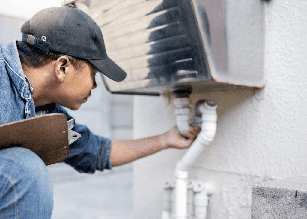 A home inspector checking home systems